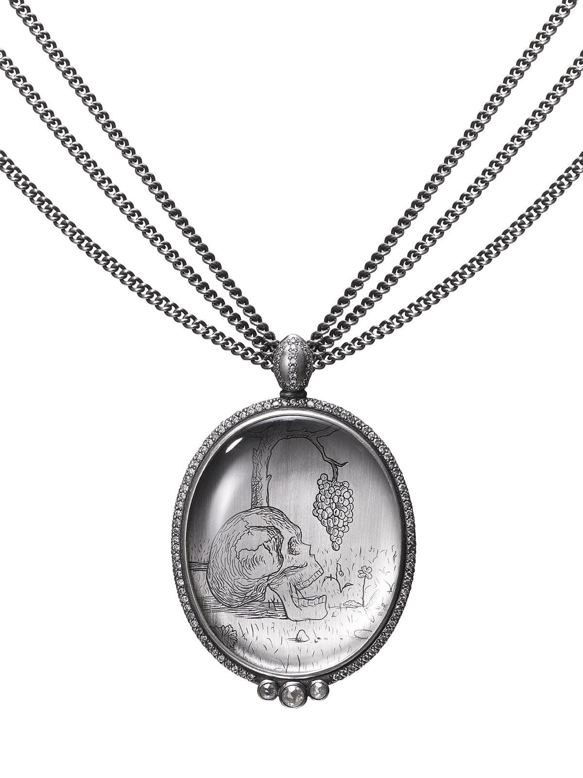 Post Festum Diamond Edition necklace by Heidi Vornan, crafted in silver with salt and pepper diamonds and rock crystal, featuring a sculptural skull pendant on a white background. Artwork by Hugo Simberg.