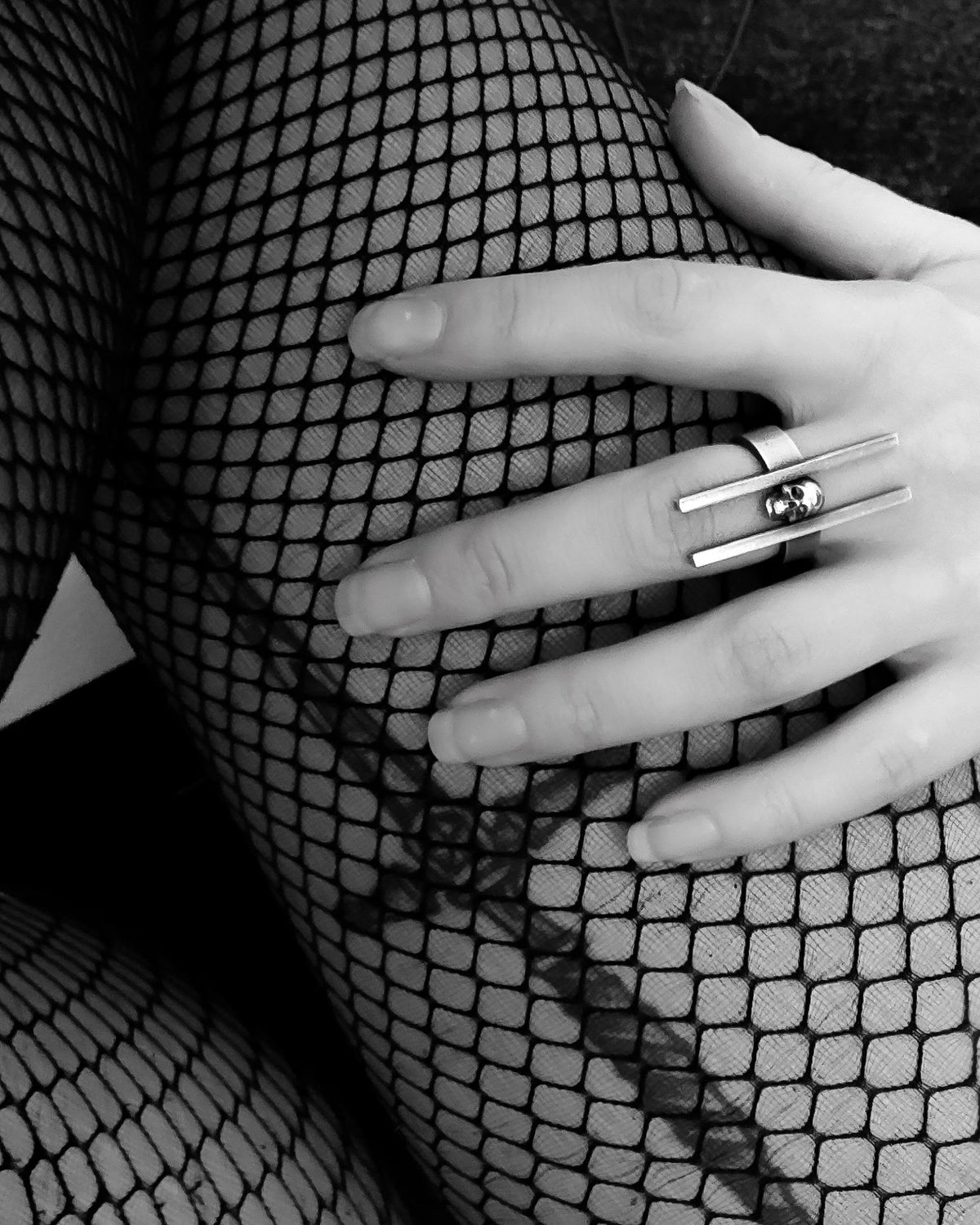 Medievil silver skull ring with black diamonds worn. Heidi Vornan Skull Collection