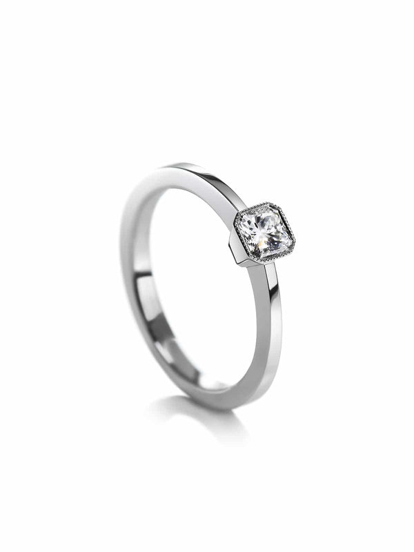 Solitaire ring with radiant cut diamond
