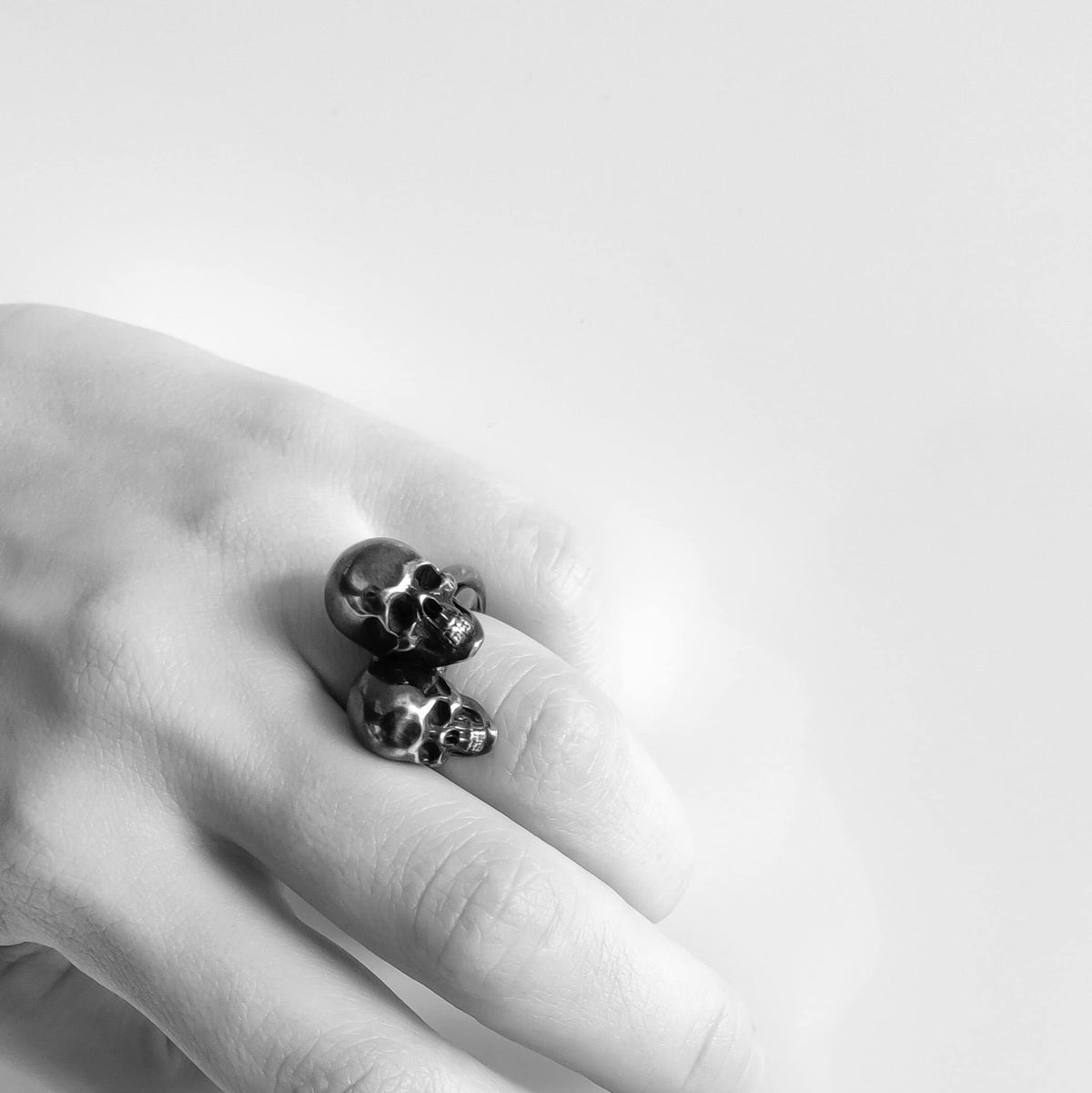 Blackened Skull ring L stacked with skull ring S. Skull Collection by Heidi Vornan